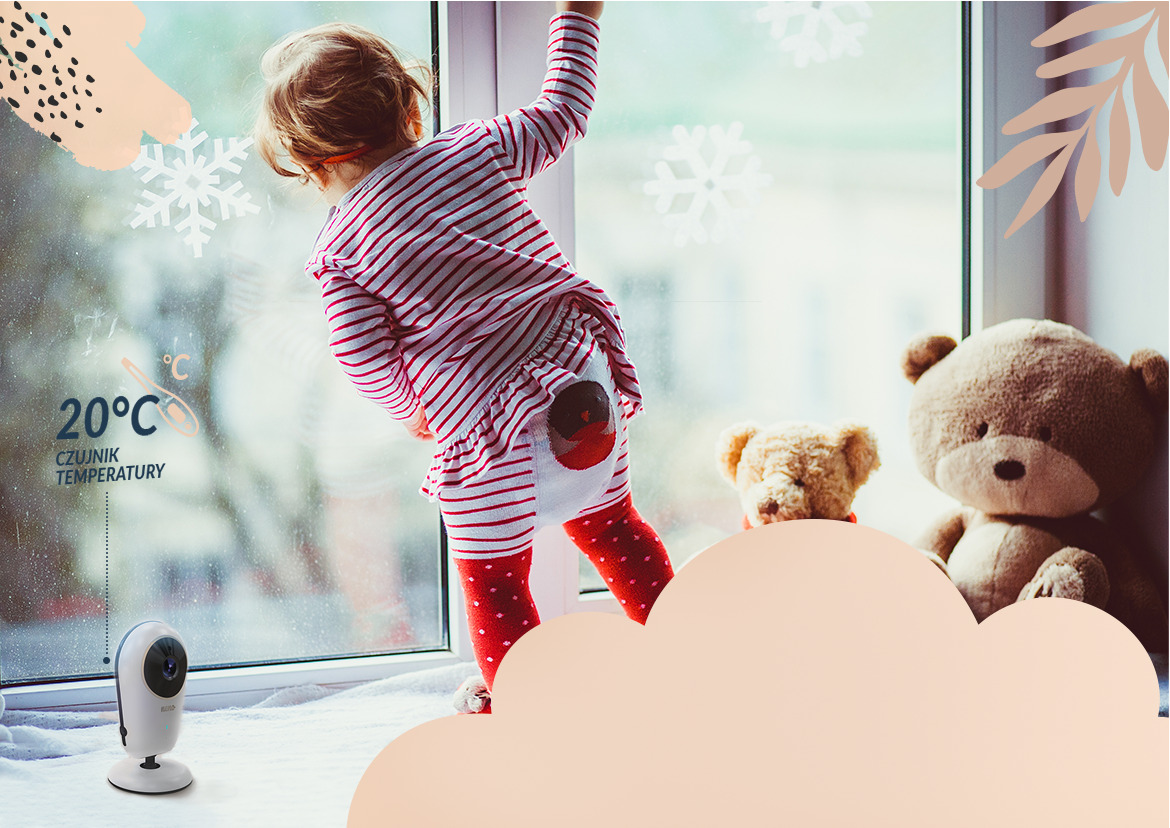 немовля, яке дивиться у вікно, і немовля поруч з ним